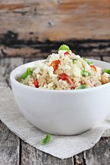 Quinoa salad with vegetables,chickpea and feta.Selective focus.