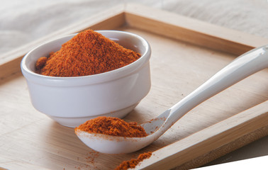 Paprika ground in a white bowl