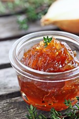 Homemade onion marmalade on a rustic table.Selective focus.