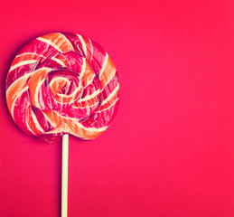 Round lollipop  isolated on the red background