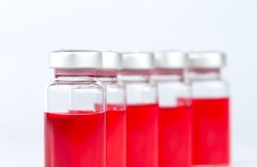 Red liquid in injection vial