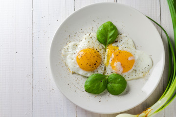 Fried eggs shape hearts Valentines dish