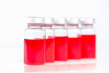 Red liquid in injection vial