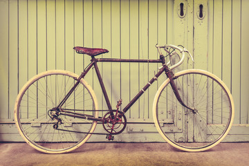 Fototapeta na wymiar Vintage racing bicycle in an old factory