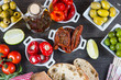 Spanish tapas on wooden rustic table from above