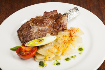Grilled beef steak, Chuletón with potatoes