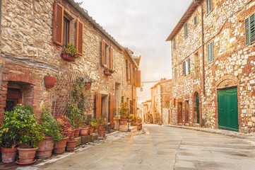 Fototapeta na wymiar The old Italian town in the colors of spring in Tuscany 