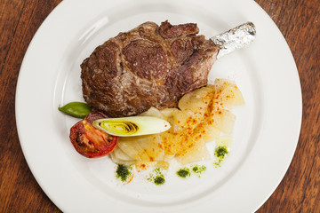 Grilled beef steak, Chuletón with potatoes