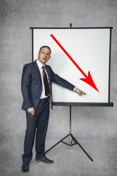 businessman shows a decrease in trading