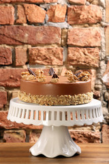 Walnut cake on white plate