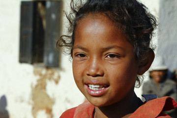 Smiling poor african girl, Madagascar