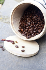 Coffee beans in wooden bowl