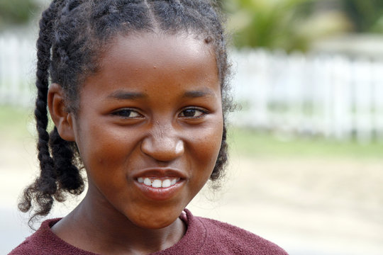 Smiling poor african girl, Madagascar