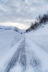 Fototapeta na wymiar Snowy road