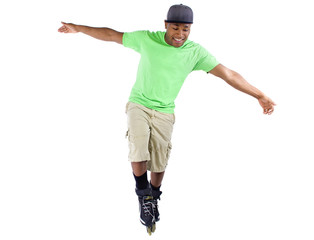 young black adult learning to balance on rollerblade skates
