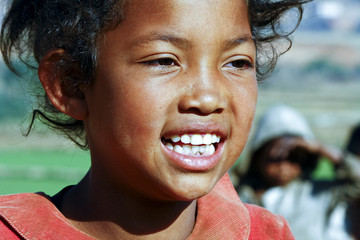 Smiling poor african girl, Madagascar