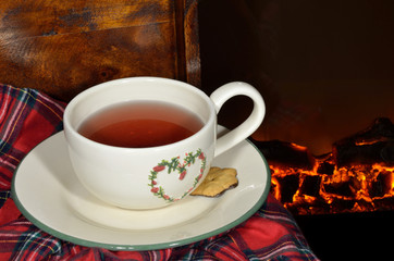 A cup of tea by the fireplace
