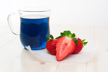 Blue Thai tea and strawberries