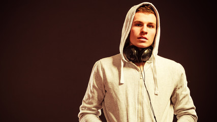 handsome man with headphones listening to music