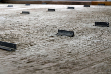 Steel angle on cement floor