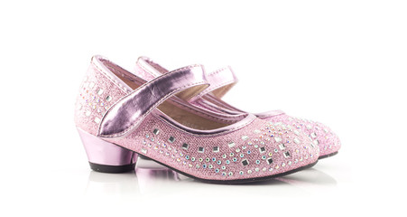 Fototapeta na wymiar Beautiful and bright pink girl shoes on white