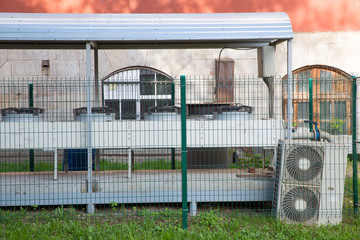 Air conditioning on background wall street
