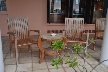 Two wooden chairs and table