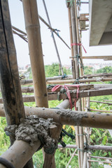 Wooden with bamboo scaffolding for construction site