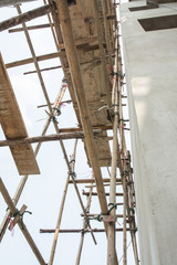 Wooden with bamboo scaffolding for construction site