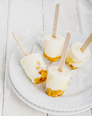 Ice cream with cloudberries, northern berries