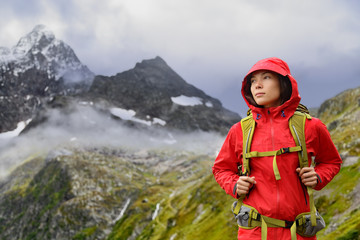 Alps Hiking - hiker woman in Switzerland mountains