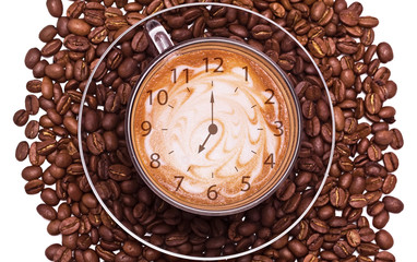 The cap of black coffee standing on grains