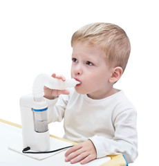 boy makes inhalation with ultrasonic nebuliser