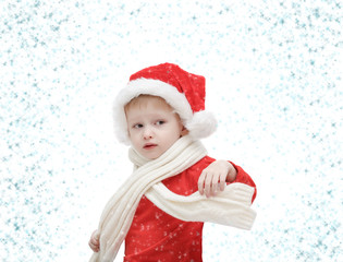 the three-year-old  child in Santa Claus and snowflakes