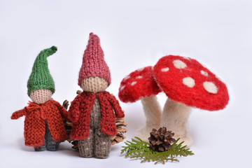 Waldorf handmade dwarfs, boy and a girl puppets and big mushrooms made by wool 