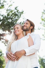 Fototapeta premium Cute couple hugging and smiling