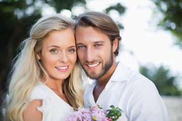 Attractive couple smiling at camera