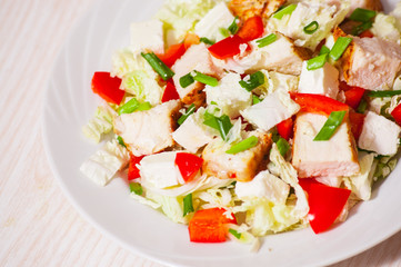 Vegetable salad with roasted chicken meat