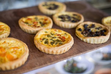 Delicious mini quiches on tray