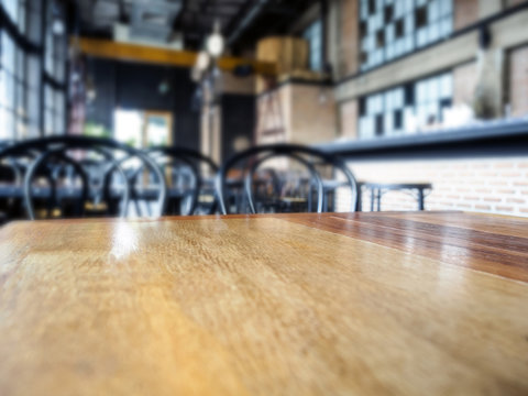 Top of Wooden table Bar Blurred Restaurant background