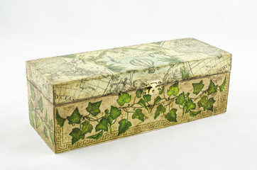Closed box with handmade floral motif.