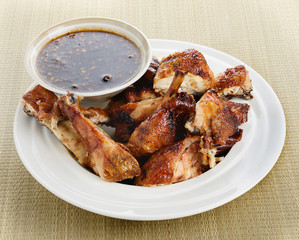 Thai grilled chicken on mat