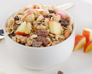 Muesli for breakfast in  white bowl