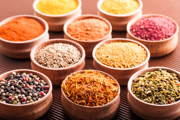 set spices in a wooden bowl close-up