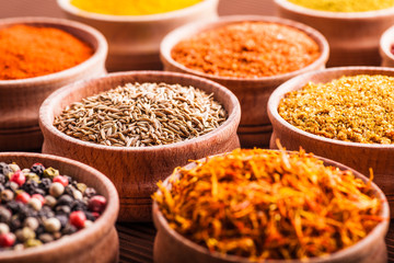 spices in a wooden bowl close-up