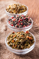 dry spices in a glass bowl close-up