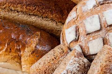 Group of different bread's type on wooden table