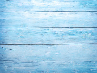 Blue wooden background.