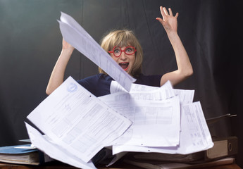 The woman throws documents