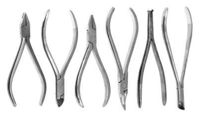 A set of six orthodontic pliers on a white background